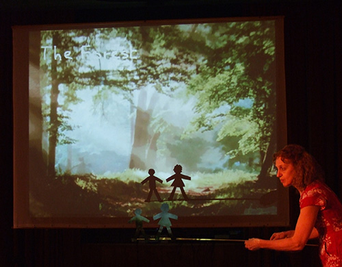 Little Brother and Little Sister in the forest.